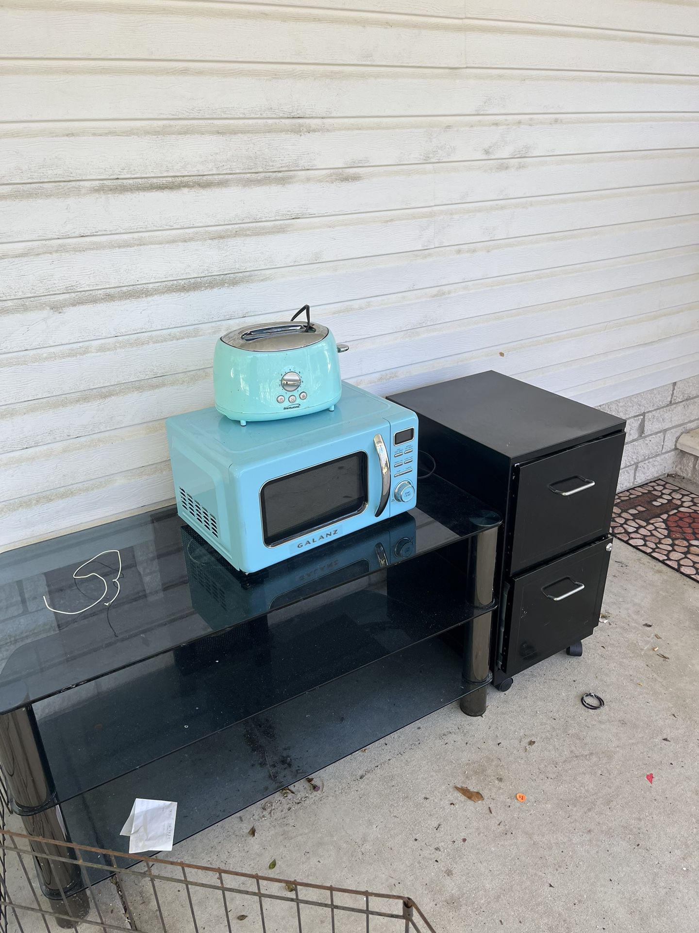 Teal Colored Microwave And Toaster