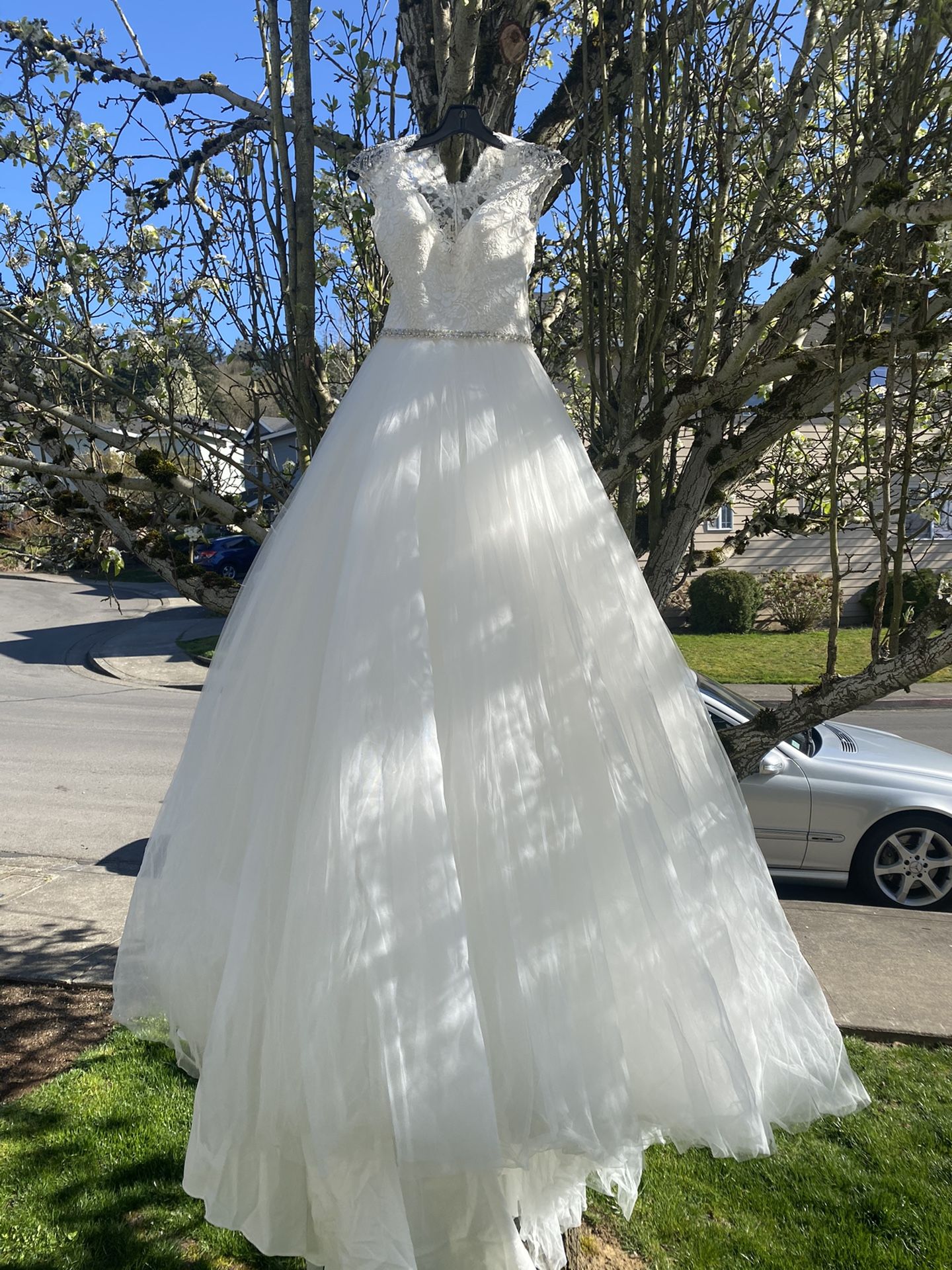 Allure Bridals Wedding Dress With A Corset And Veil