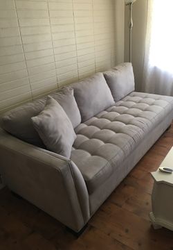 Light gray sofa very good condition bought it at rooms to go having a moving sale everything needs to go