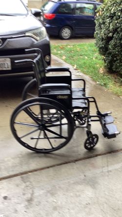 Drive wheelchair excellent condition right with easy to fold in curry