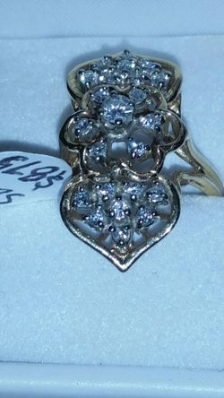 14 karat gold with genuine diamond ring