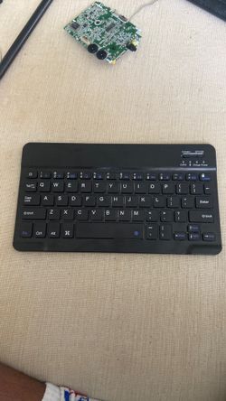 Bluetooth, Wireless, rechargeable, keyboard. That can be used for all devices including phones and tablets and laptops.