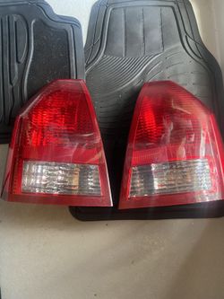 (1 Review) 2005-2007 Chrysler 300 Tail Light Driver Left and Passenger Right Side
