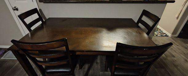 Table with 4 Chairs (Used)