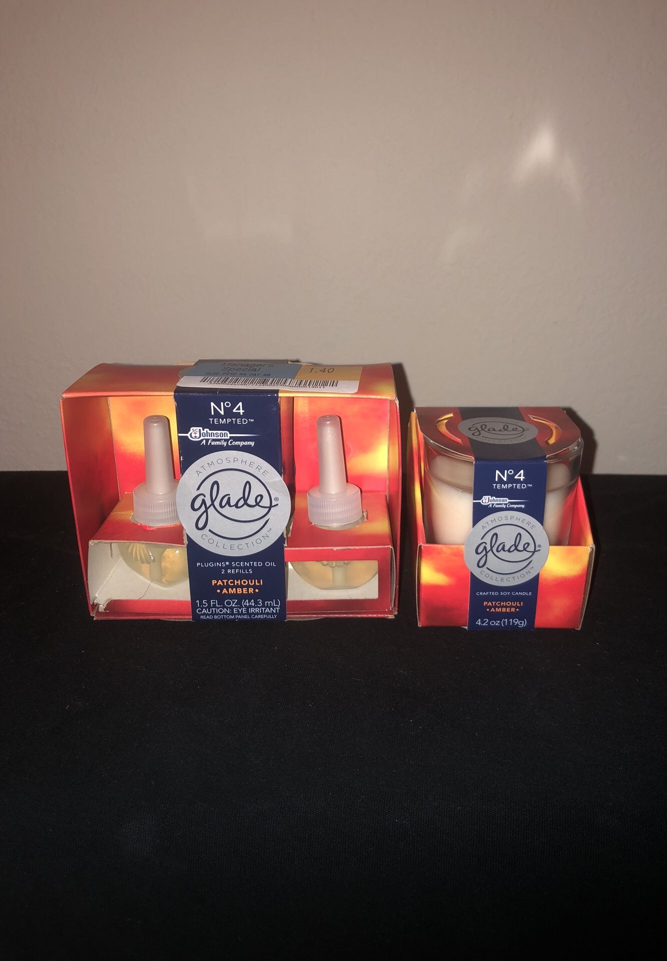 GLADE ATMOSPHERE COLLECTION PATCHOULI AMBER CANDLE & PLUG-INS