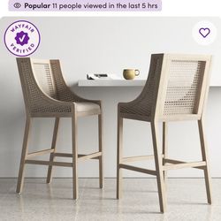 Two rattan upholstered counter stools new farmhouse contemporary light wood beige kitchen furniture