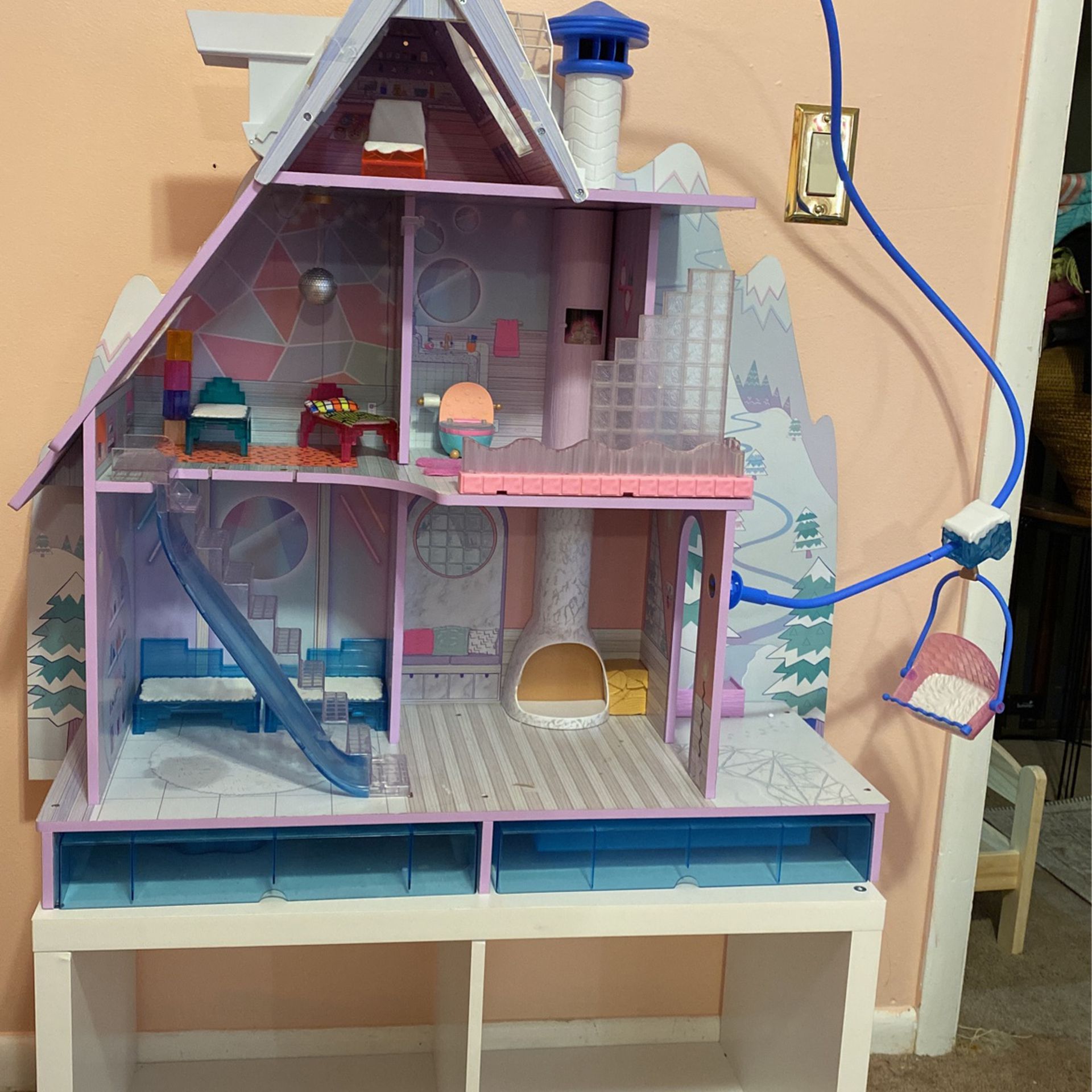 LoL Chalet doll house with all the surprise accessories to go along with it pool, skating ring, and electric snow chimney And  Sled ride