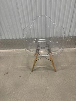 Lucite shell chair… 27” high , 24” depth , 25” wide . $50