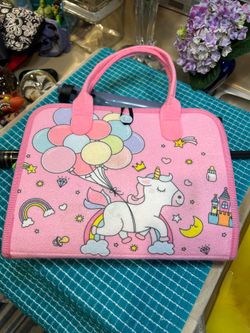 Pink Unicorn Felt Montessori Busy Board designed to help toddlers develop fine m