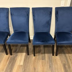 Four Blue Velvet Upholstered Dining Chairs