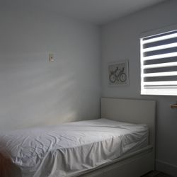 Twin bed frame with storage + clean twin mattress