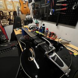 GUITAR REPAIR/SET UPS