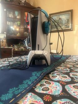 Slightly used disc version of the PlayStation 5 with over an $100 headset
