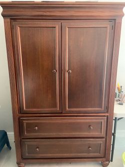 Wood armoire.