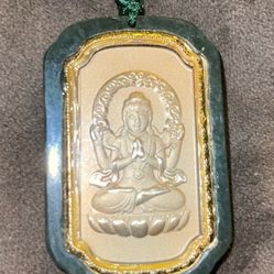 Certified genuine Hetian Jade Guayin with 24k gold overlay.