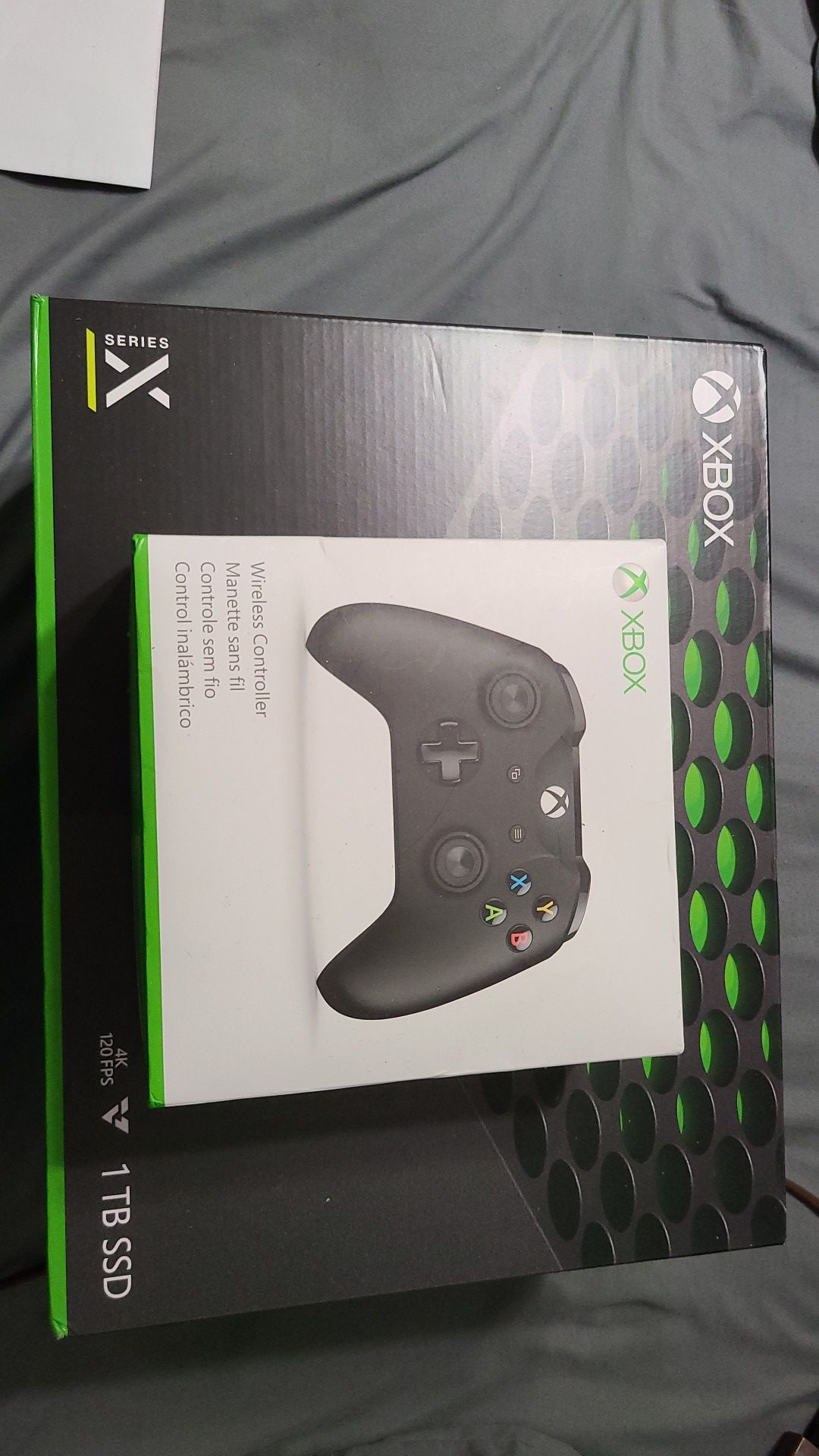 Xbox series x with an extra xbox one remote