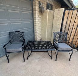 Patio set. All metal. Chairs. Coffee table. Nice condition.