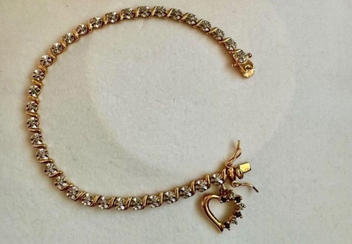 Vintage 925 sterling silver gold cubic zirconia tennis rhinestone bracelet with heart shaped charm Approx 7.75” length In great condition