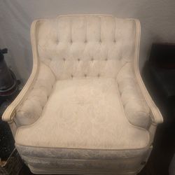  Vintage tufted armchair.