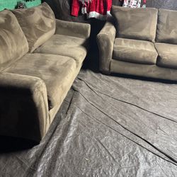 Brown couch and loveseat good condition clean we sell all the time delivery extra $40 local