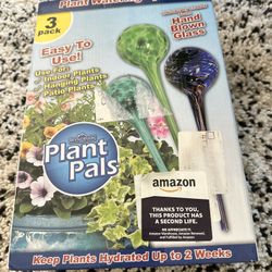 Plant watering system crafted from Hand blown glass /Plant Pals