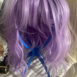 short purple  wig in good condition