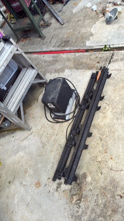 Remote fence opener