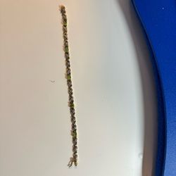 Gold and Silver Tennis Bracelet with Green Stones