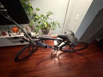 Black and Blue Mountain Bike with Shimano Drivetrain