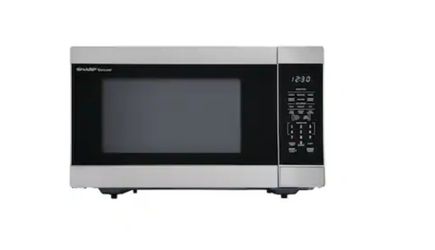 STAINLESS STEEL MICROWAVE OVER THE COUNTER....NEW....$ 120