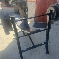 Adjustable bench with barbells and weights for sale