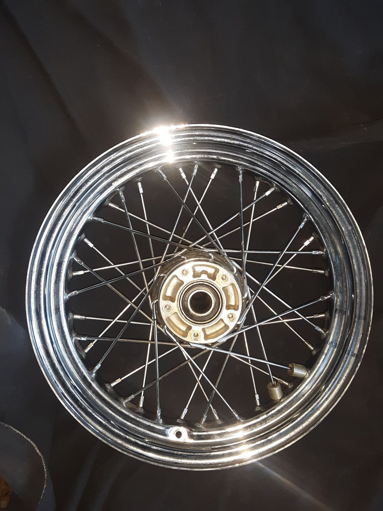 Harley Davidson front wheel for duel rotors.