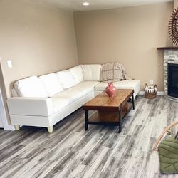 White Leather Sectional Couch And Ottoman