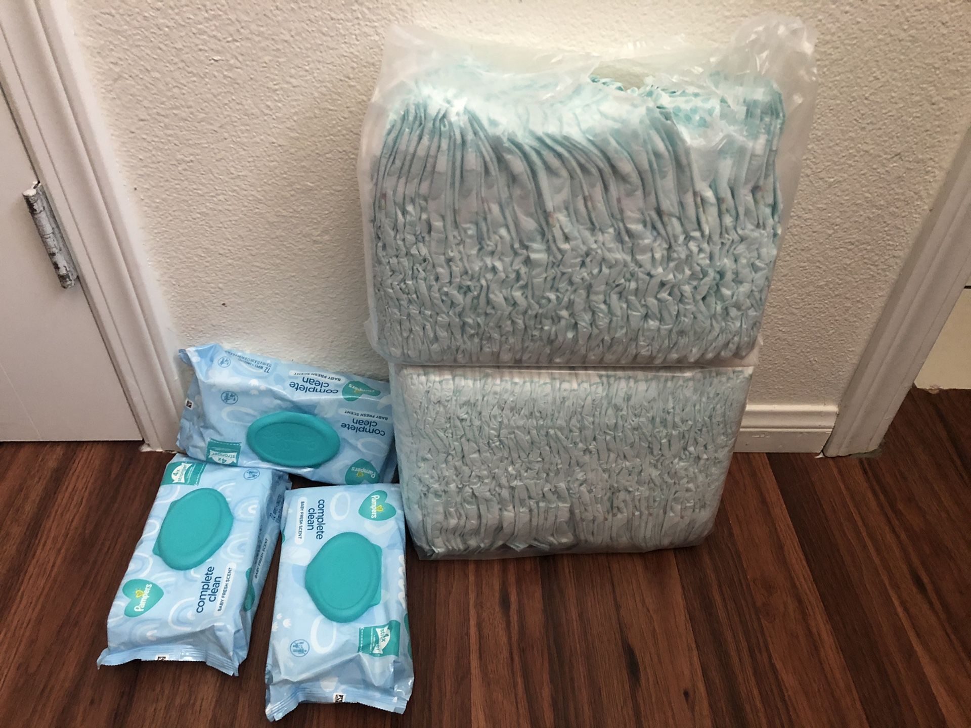 Pampers diapers and wipes , one bag is open , 65diapers in all ,size 5 in total , everything for $20