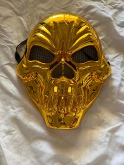 Two gold Skeleton mask
