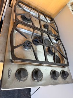 Kitchen stove, wall fan and counter top fan