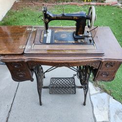 Antique Sewing Machine And Table 