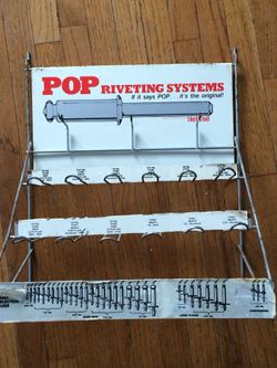 Vintage pop rivet advertising stand for pegboard
