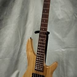 Brand new 5 string electric bass with new bag and cable