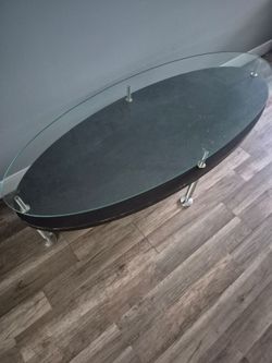 Glass coffee table 25.00  firm