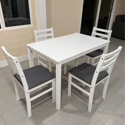 White dining table and chairs