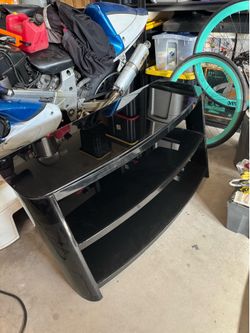 Metal and glass entertainment center
