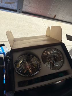 97-06  jeep wrangler headlights oem