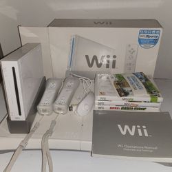 Wii Console + Balance Board + Games