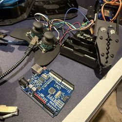 2 Robotric arms, Chargers, Raspberry pi 4 B, Arduino Uno,