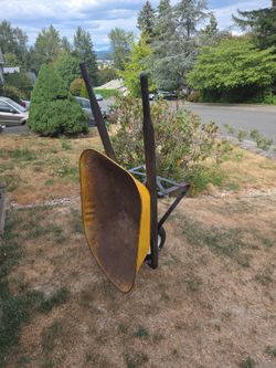 Metal wheelbarrow  filled tire