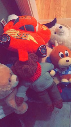 Bin full of stuffed animals