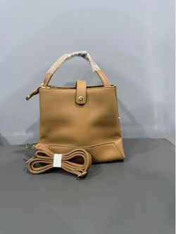 Tan hand bag