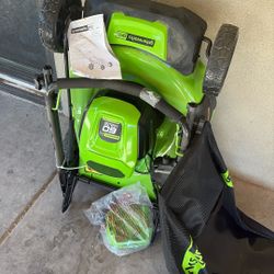 Green works  Pro 60volts Lawn Mower With Charger 
