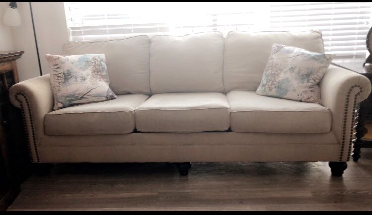 2 sofas for sale Ashely brand 250 negotiable price